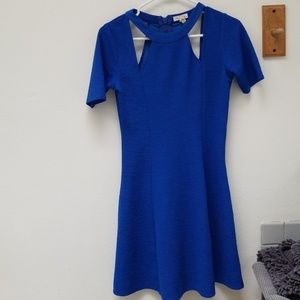 Bright blue geometric cut out dress